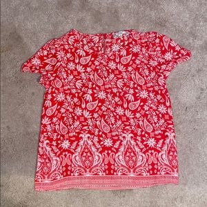Floral pattern, red blouse.